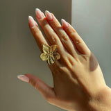 ADJUSTABLE GOLDEN FLOWER RING